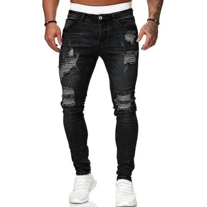 “Black ripped men’s denim jeans with slim fit and ankle length, distressed punk style”
