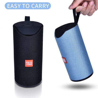 Portable waterproof Bluetooth speaker with attached carabiner and mesh exterior"
